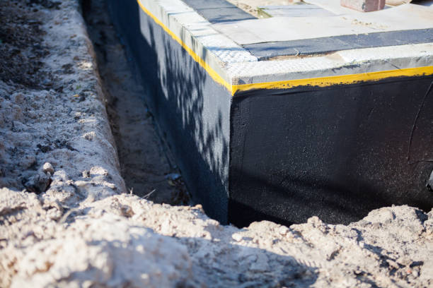 Professional Exterior Waterproofing technician working in Spring Hill, KS